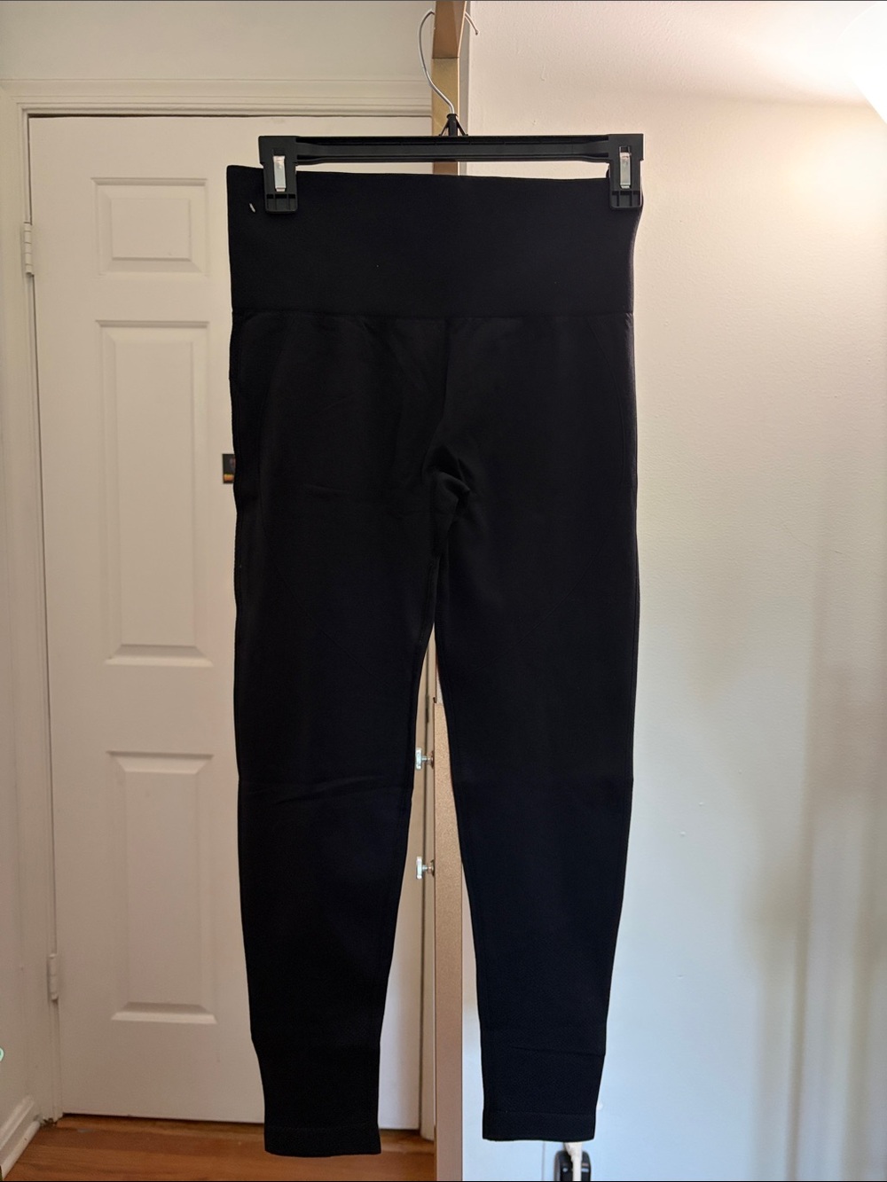 HALARA Black High-Waist Leggings scrunch and lift booty.